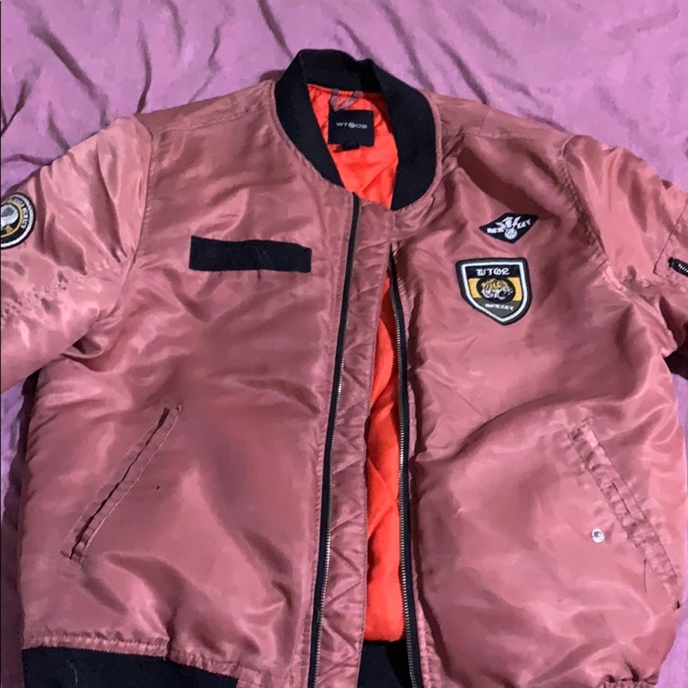 “Remove before flight” bomber jacket